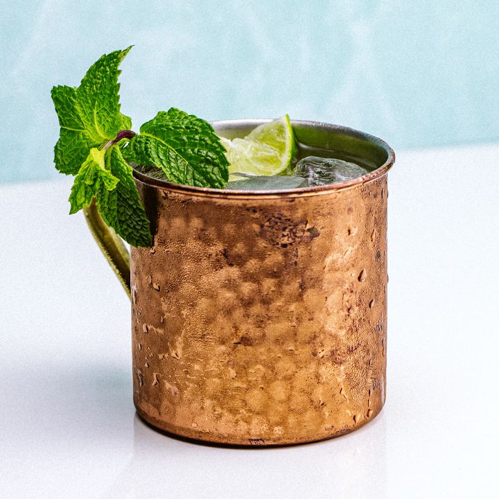 moscow mule cocktail inside a copper cup
